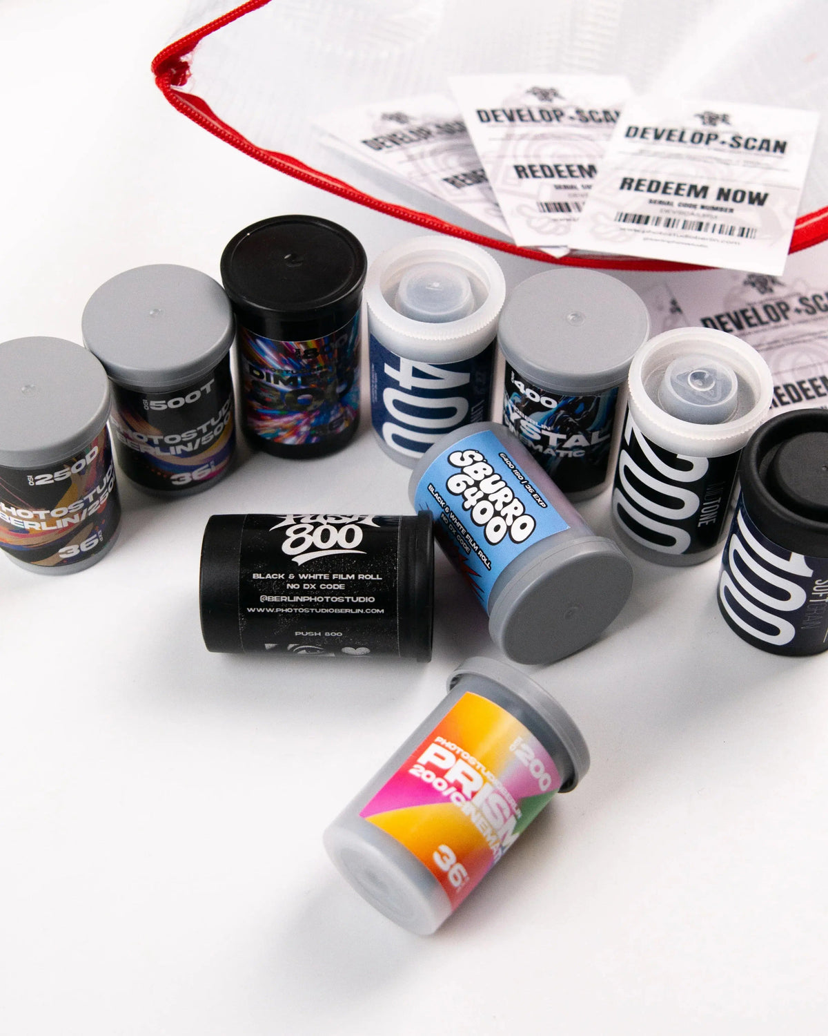 Assorted film rolls and written processing notes