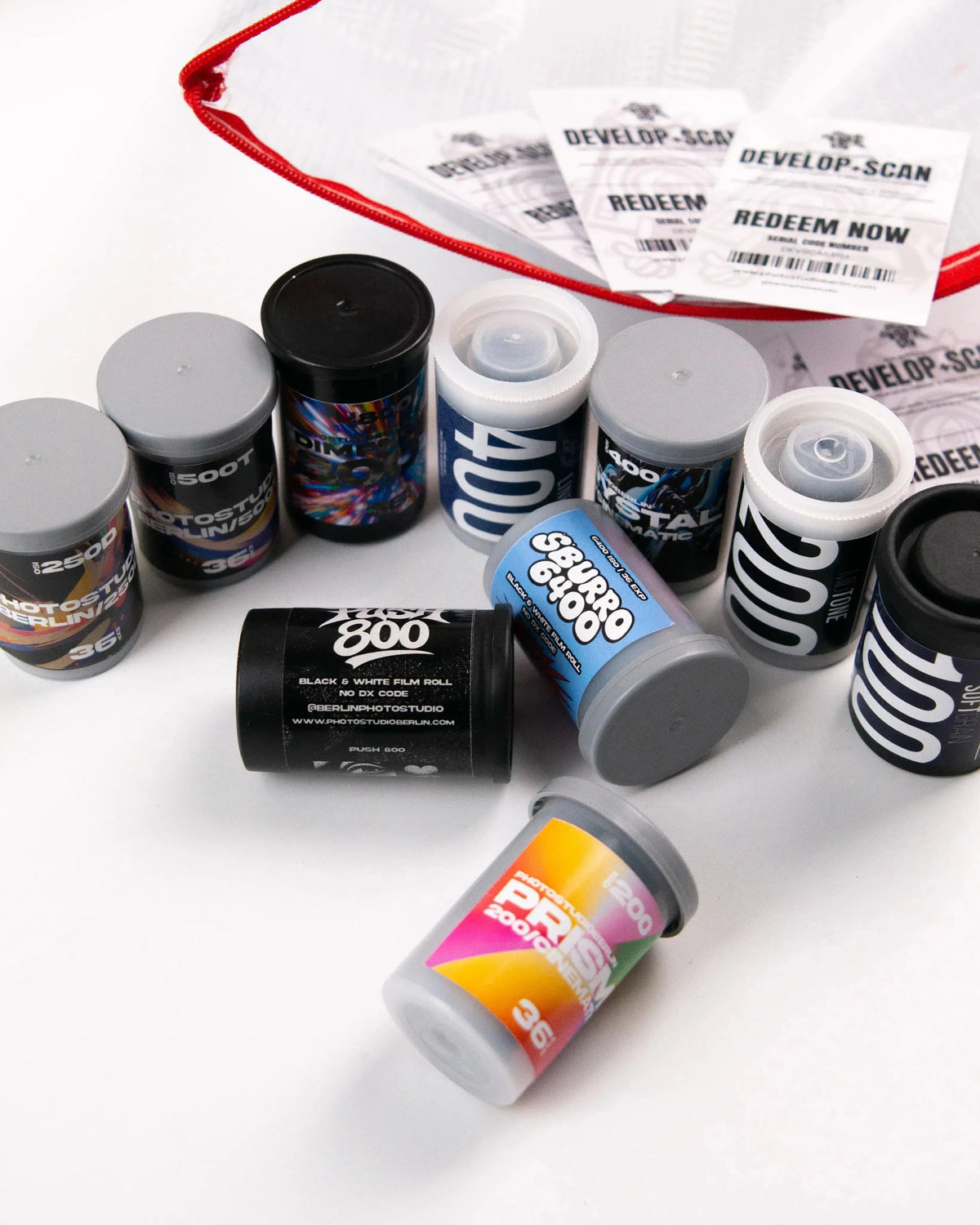 Assorted film rolls and written processing notes