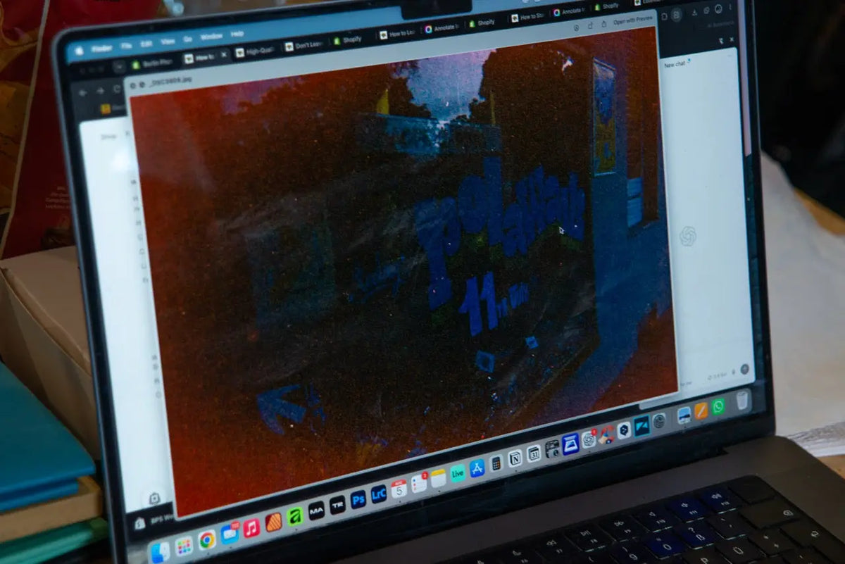 Photograph being reviewed on a computer before printing