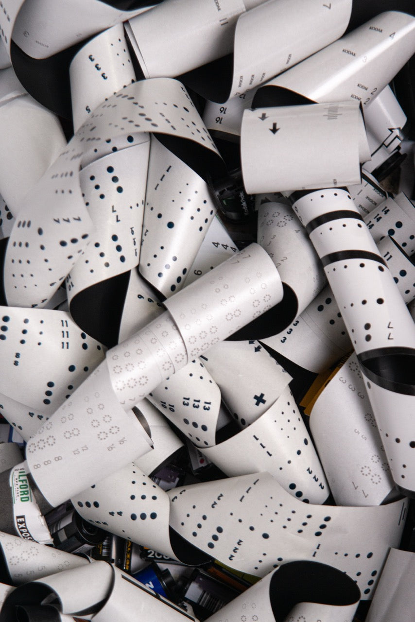 Coils of clear film with visible perforations