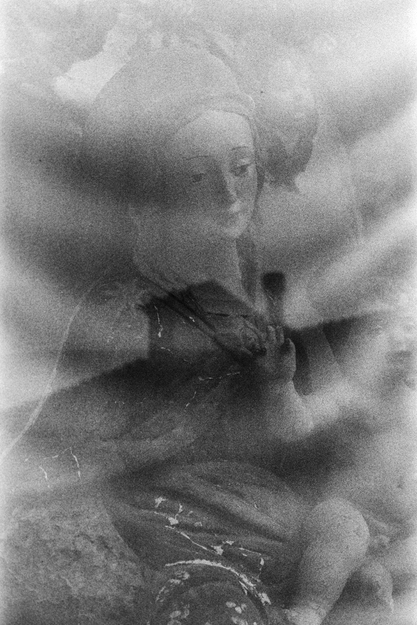 Close-up showing pronounced grain in a black-and-white photograph