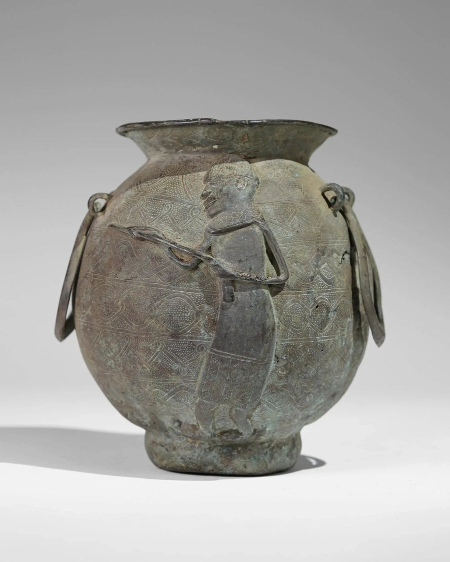Sculptural vessel photographed against a neutral background