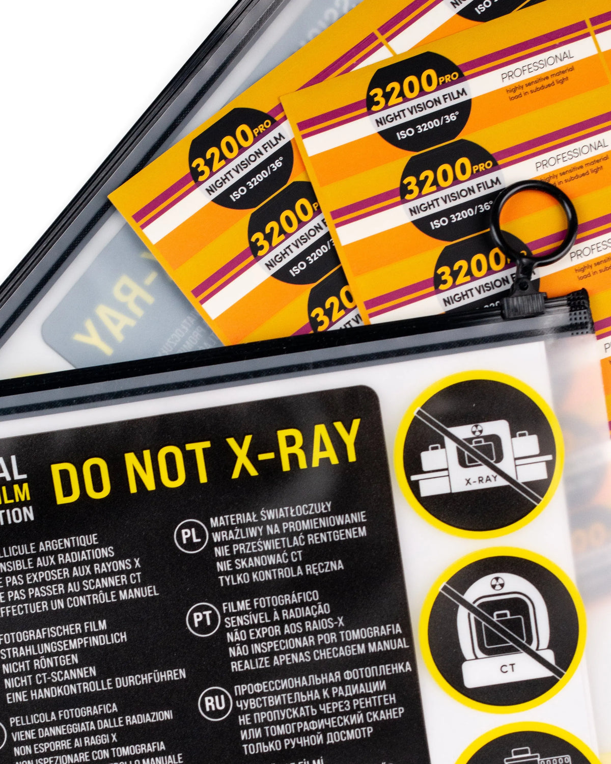 Film rolls beside a bag marked Do Not X-Ray