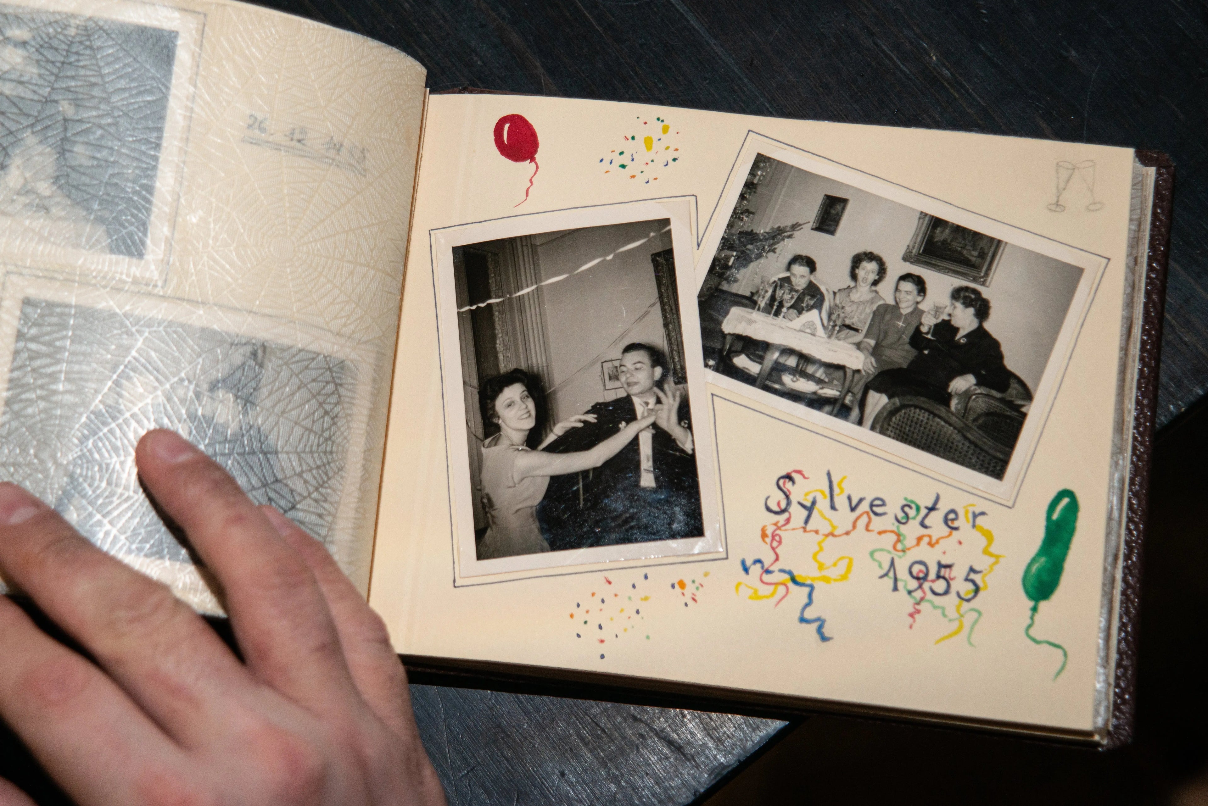 Vintage family photographs preserved in an archival photo album