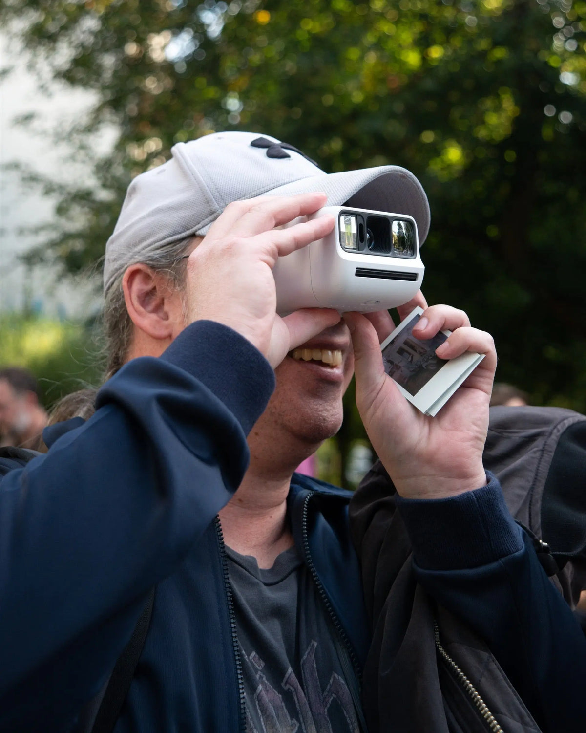 Participant taking a photograph during a Polawalk