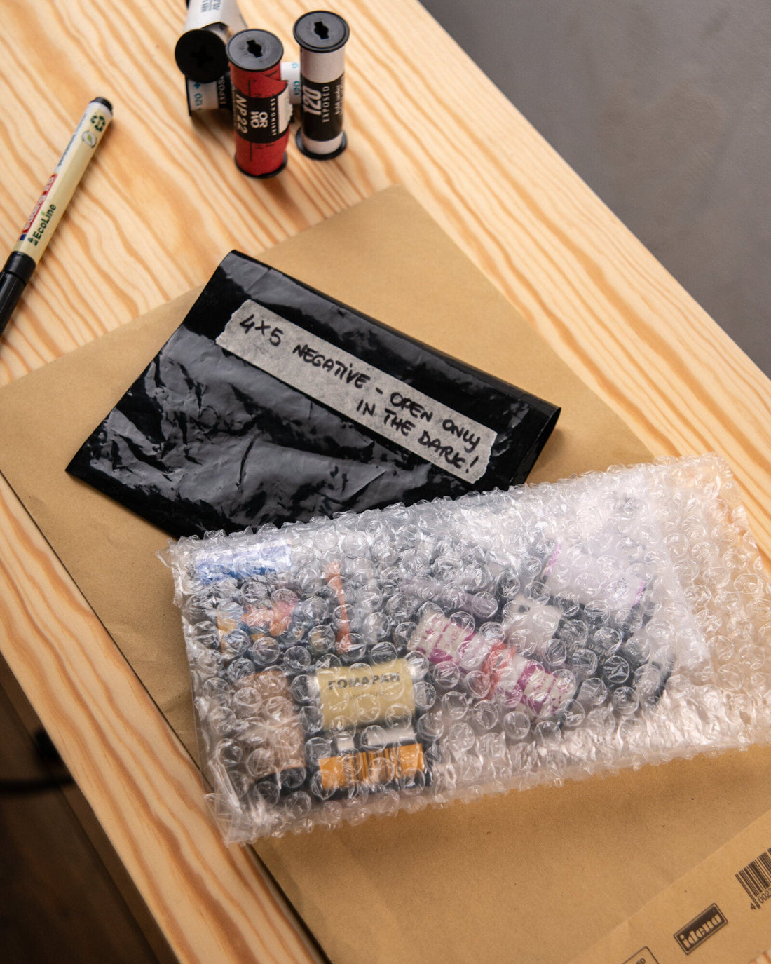 Film rolls protected with bubble wrap before shipping