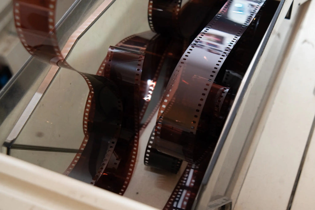 Developed film leaving the processing machine
