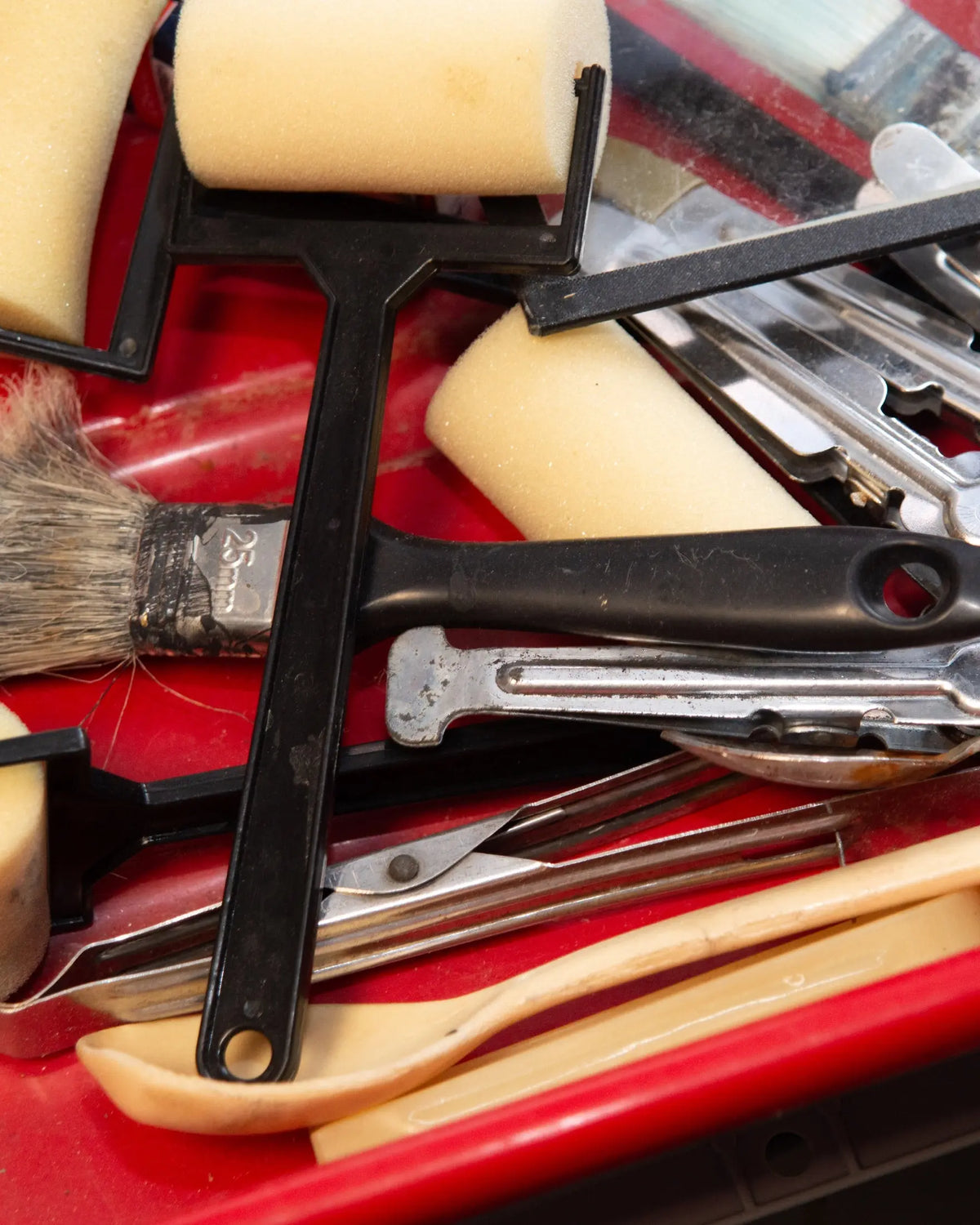 Brushes and rollers used in the analogue lab at Berlin Photo Studio