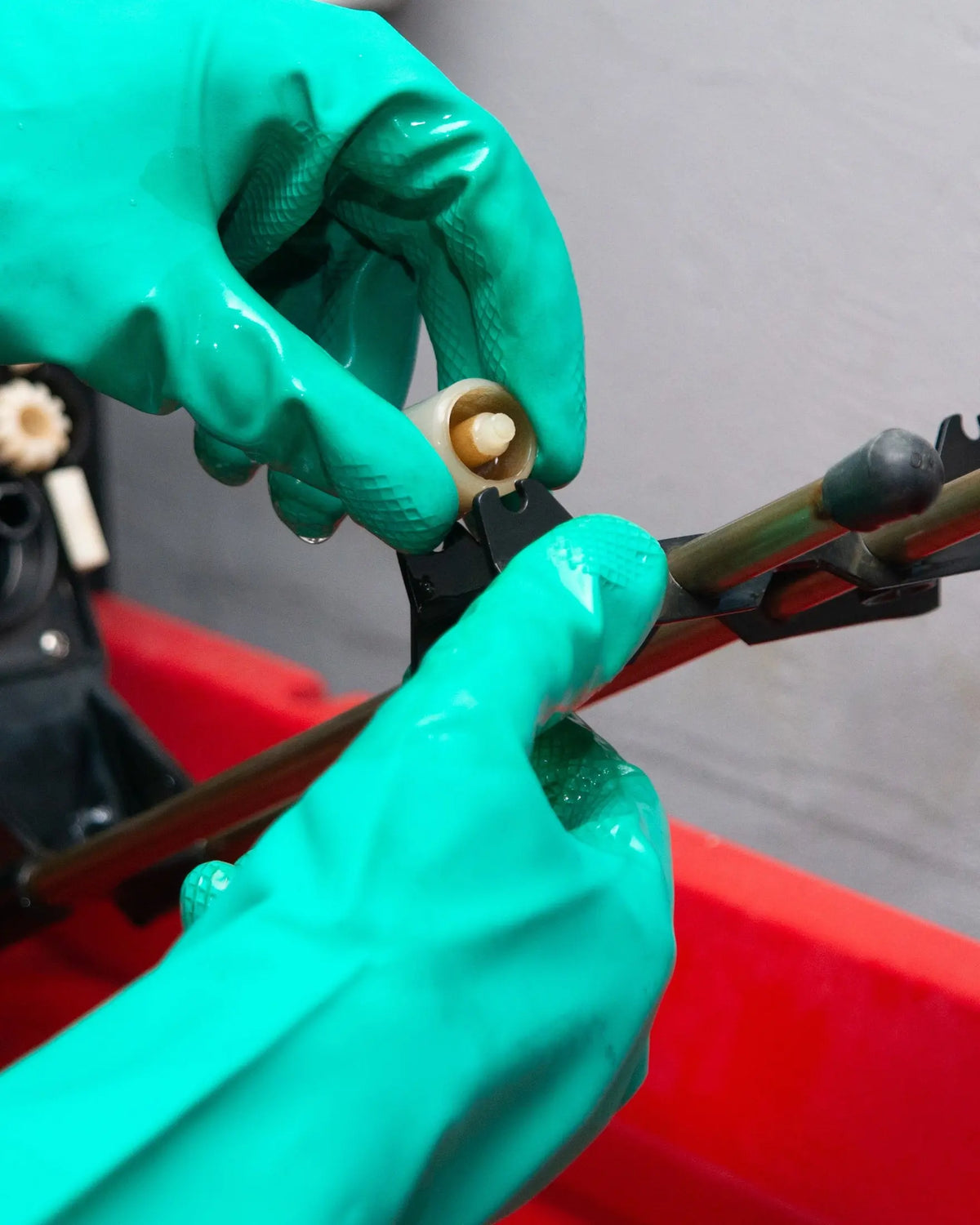 Close-up of the tank support rollers being adjusted at Berlin Photo Studio