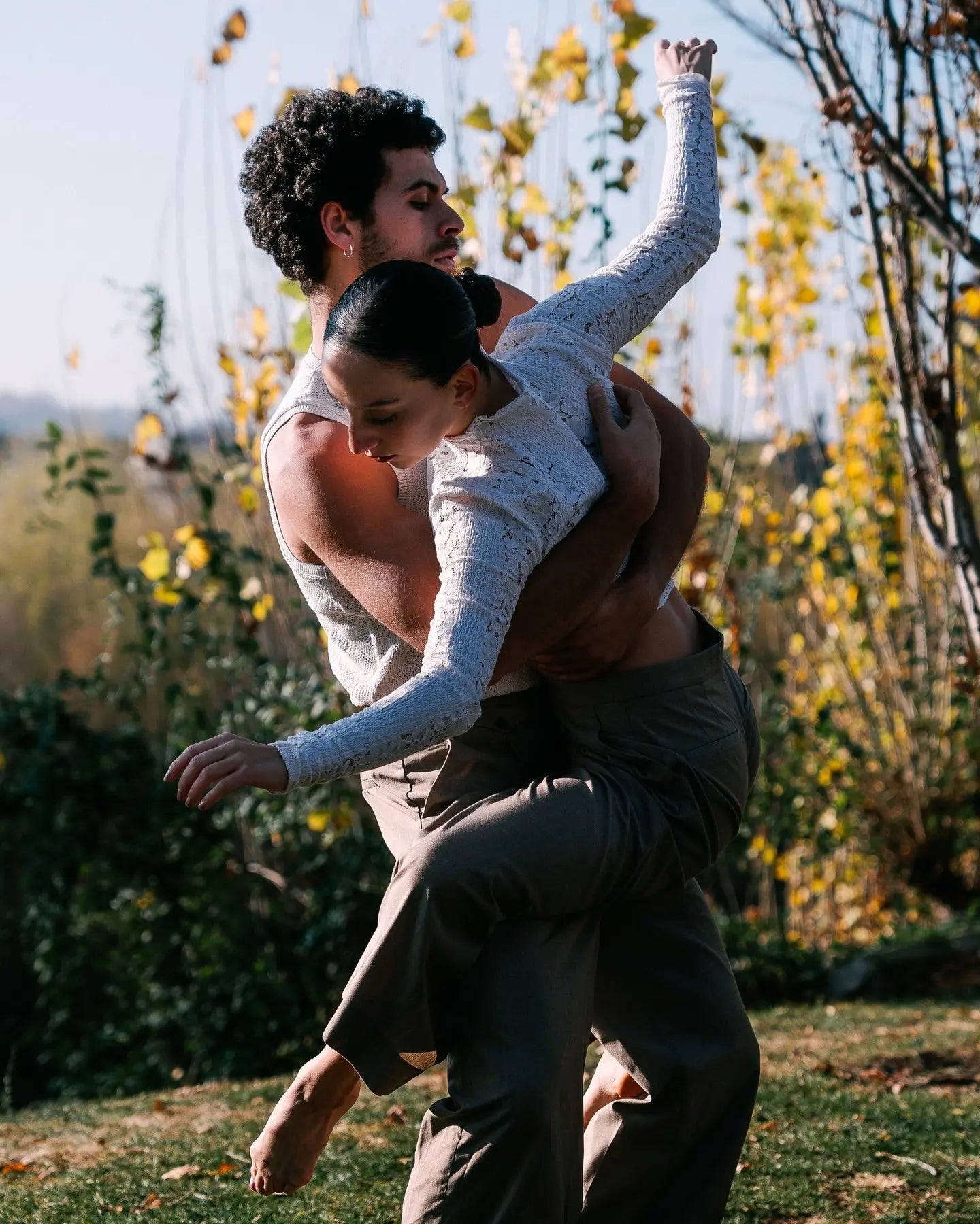 Outdoor movement portrait of a dancer duo in Berlin